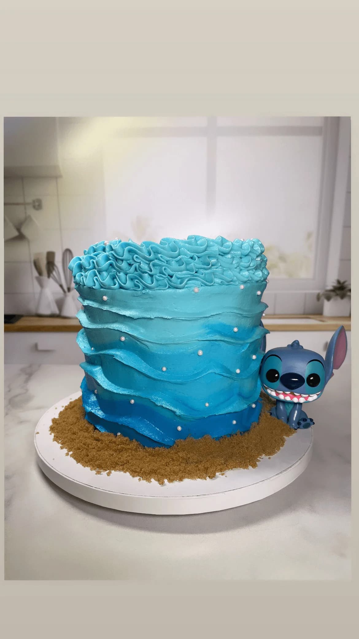 Lilo and Stitch ocean themed cake with beach sand texture