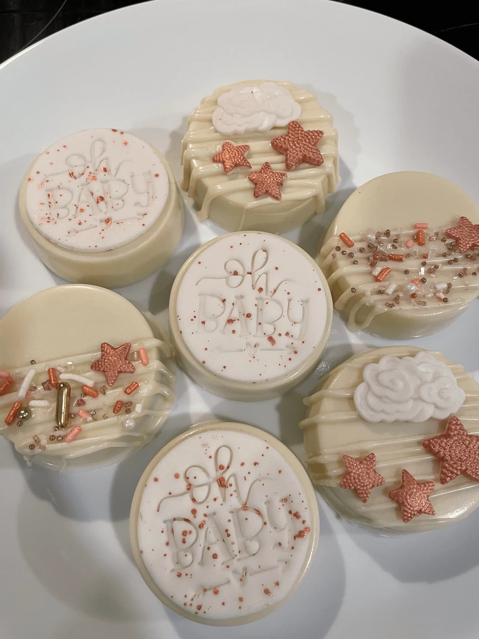 Baby shower themed Oreos with Oh Baby decorations